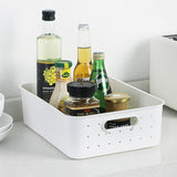 Witte opbergmand met deksel en label